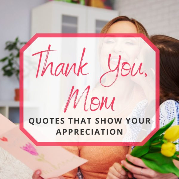 photo of a daughter kissing her mom who's holding tulips and a mother's day card